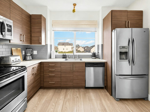 Fully equipped kitchen with contemporary finishes and natural light throughout