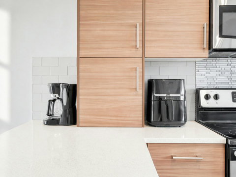 Sleek modern kitchen equipped with quality appliances and ample counter space