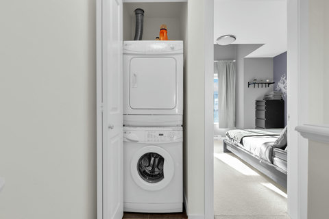 Convenient in-unit laundry with stacked washer and dryer setup