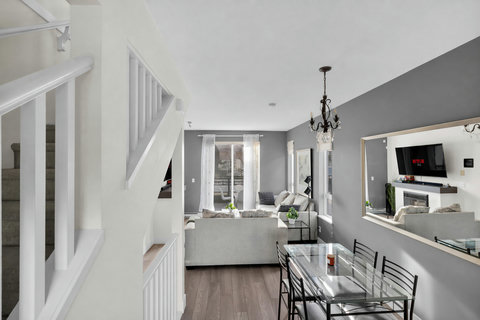 Stylish open-concept living and dining area perfect for gatherings