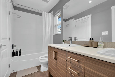 Spa-like master bath with double vanity and spacious walk-in shower
