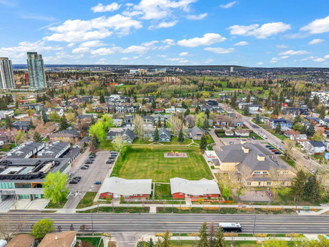 Stunning aerial perspective showcasing lush green spaces and vibrant community below.