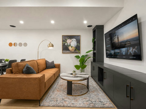 Stylish living room with comfortable seating and entertainment setup