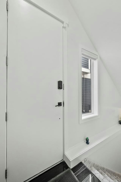 Bright, welcoming entryway with natural light and modern finishes.
