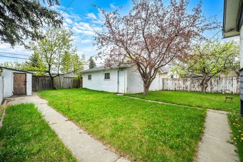 Large private backyard perfect for outdoor relaxation and play