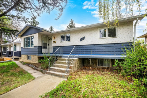 Charming split-level home with modern updates and inviting front deck