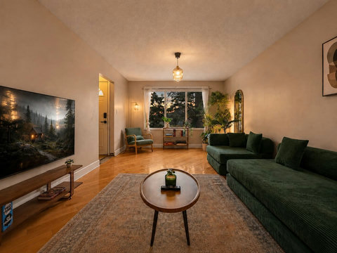 Spacious living room with comfortable seating and natural light