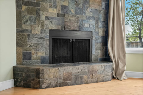 Elegant stone fireplace perfect for cozy evenings by the fire