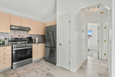 Bright, updated kitchen perfect for preparing home-cooked meals together