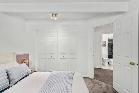 Bright master bedroom with direct access to your private ensuite bathroom