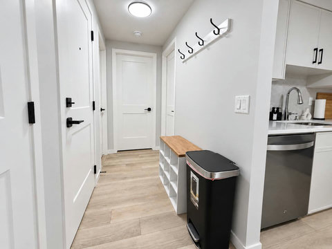 Entryway with coat hooks and shoe bench