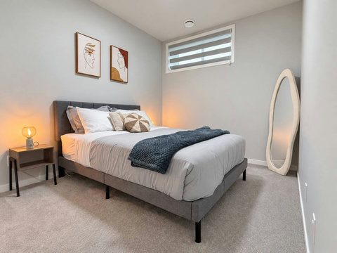 Bedroom 2 with full-length mirror