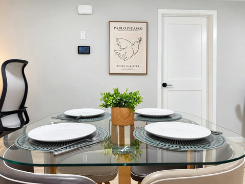 Glass dining table with seating for 4