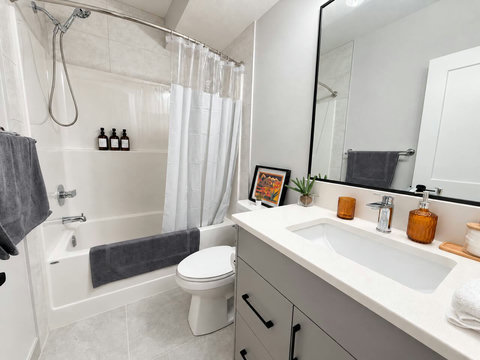 Full bathroom with tub and shower combo