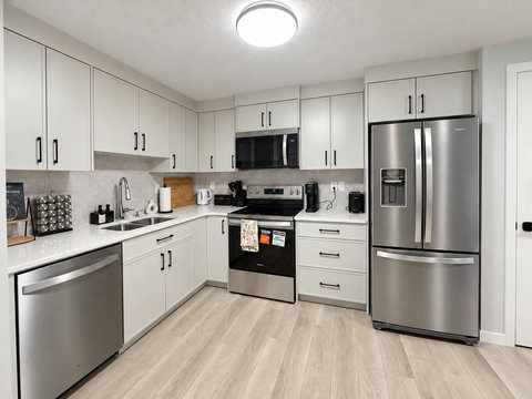 Modern kitchen with stainless steel appliances