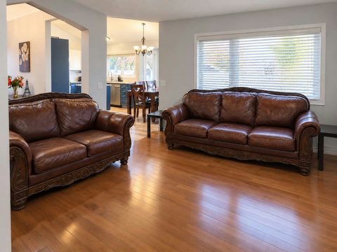 Family living room seating on the main floor, with the dining area beyond. Separate from the front living room.