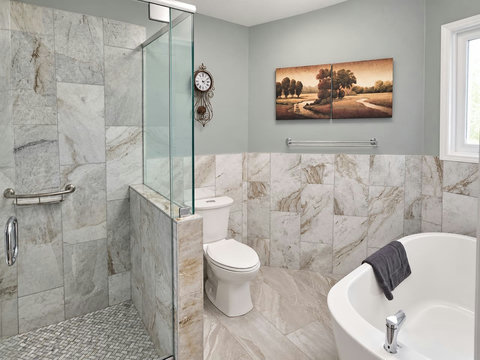 Primary ensuite bathtub and shower, shown from another angle.