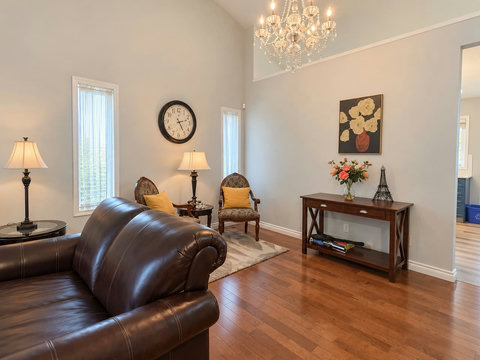 Accent seating, artwork and console table in the front living room.