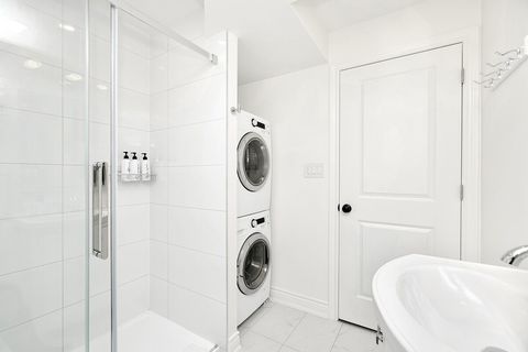 Full bathroom with glass shower enclosure. Free washer and dryer in the unit. 