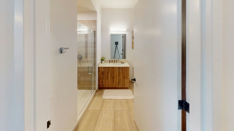 Bathroom with Full Shower. Single Sink Vanity