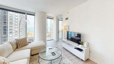 Corner Apartment with Balcony and Lake and Skyline Views