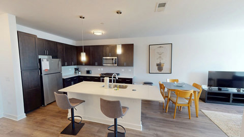 Full kitchen with kitchen bar