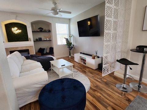 Clean and comfortable living room (65" Smart TV, Pool Table, Board games)