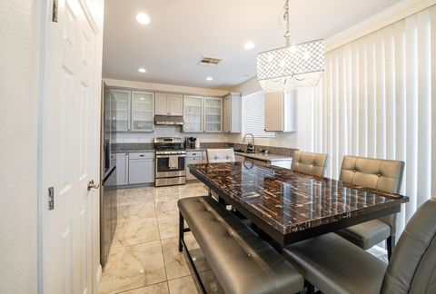 Kitchen with additional dining table set