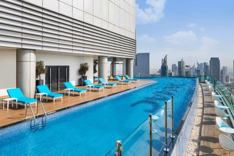 Relax and unwind at the 64th-floor pool, offering the ever amazing views of the Burj Khalifa!