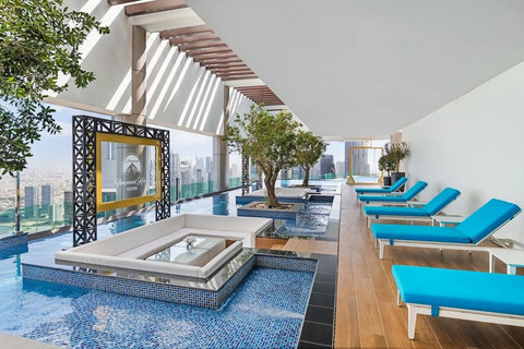 Relax and unwind at the 64th-floor pool, offering the ever amazing views of the Burj Khalifa!