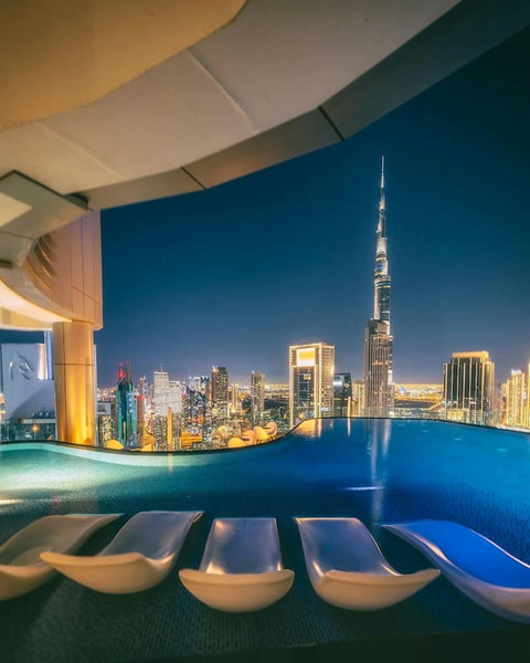 Relax and unwind at the 64th-floor pool, offering the ever amazing views of the Burj Khalifa!