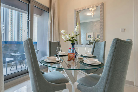 Enjoy meals at a cozy dining space with seating for 4 guests. Perfect for dining in, working, or relaxing with a coffee—plus direct access to your private balcony.