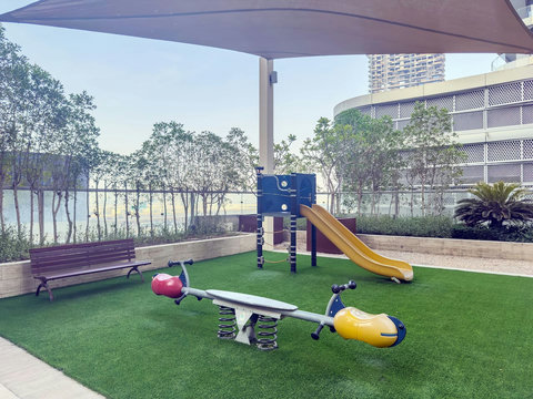 The playground features various activities for children to enjoy and safe space for kids to enjoy and explore.