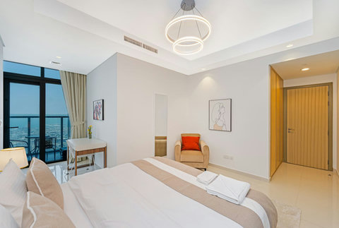 A cozy king bedroom, you’ll love the decorative pillows and luxurious finishes!