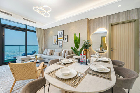 Gather around the chic dining table, comfortably seating six, and enjoy your delicious meals while taking in the amazing views.