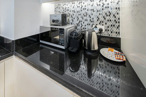 Coffee kitchen nook set in a spacious corner of the kitchen area.