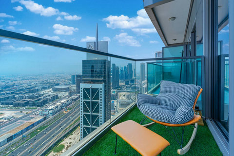 Enjoy a panoramic view of the bustling city, with towering skyscrapers and modern architecture, all set against an urban landscape from your balcony.