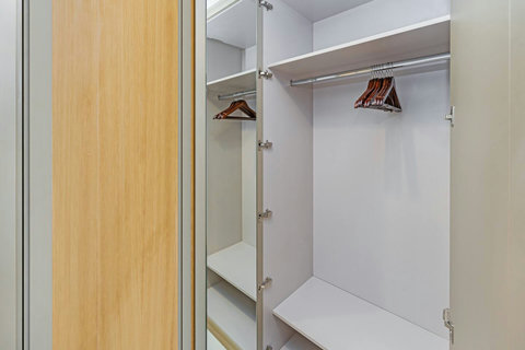 You'll have access to a spacious walk-in closet, perfect for storing your luggage and other belongings.