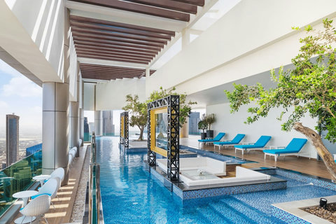 Relax and unwind at the 64th-floor pool, offering the ever amazing views of the Burj Khalifa!