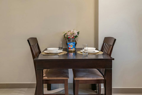 Enjoy your meals at a cozy dining space with seating for 2.