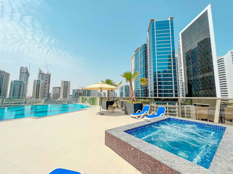 Take a dip or relax by the pool with free access while enjoying views of the iconic Burj Khalifa.