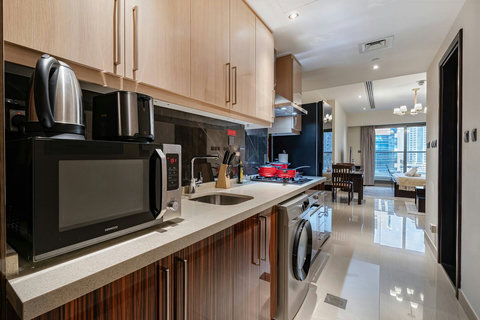 Cook up in a fully equipped kitchenette with modern appliances and plenty of storage.