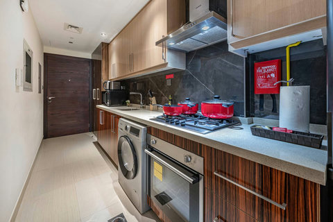 Cook up in a fully equipped kitchenette with modern appliances and plenty of storage.