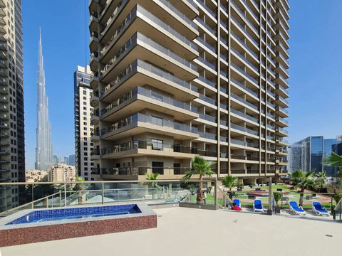 Take a dip or relax by the pool with free access while enjoying views of the iconic Burj Khalifa.