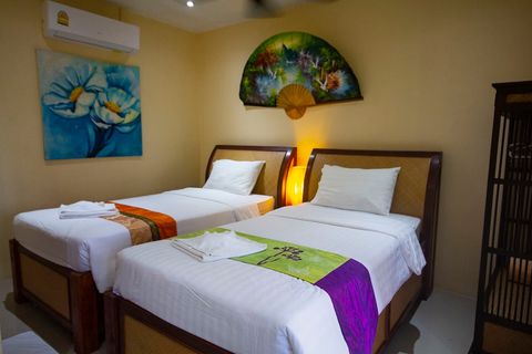 Two single beds that can be pushed together for double bed.