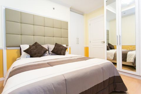 Ample storage space with mirrored wardrobe