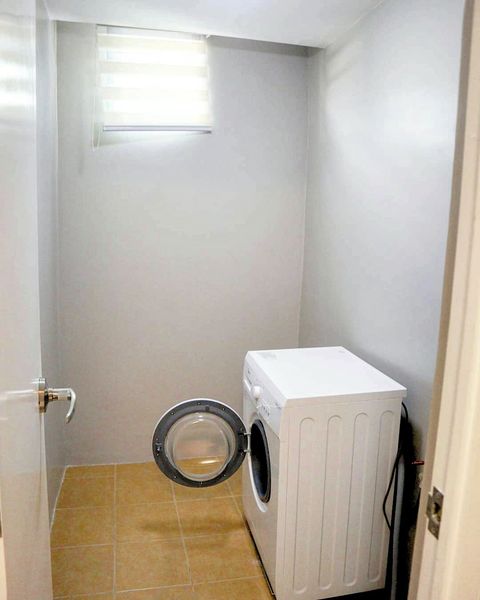 Washing and laundry area in apartment