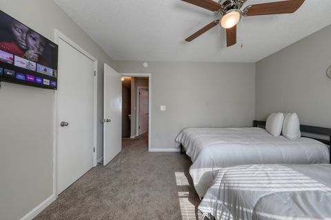 Bedroom: Bright and airy retreat with plush beds and a smart TV for ultimate relaxation.
