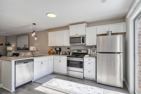 Kitchen: Culinary adventures await in this stylish oasis with sleek appliances and bright design!