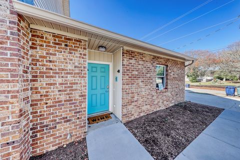 Bright turquoise door welcomes you to your beachside retreat! Step into fun and relaxation.